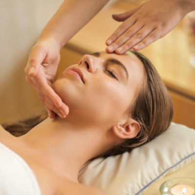 lady receiving head massage